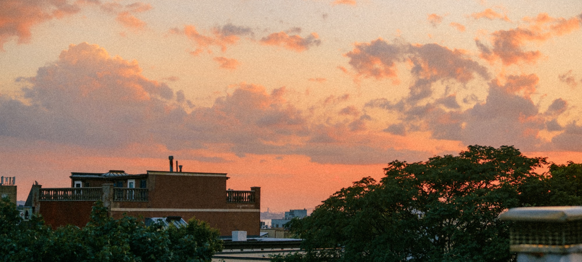 City skyline from a balcony at golden hour