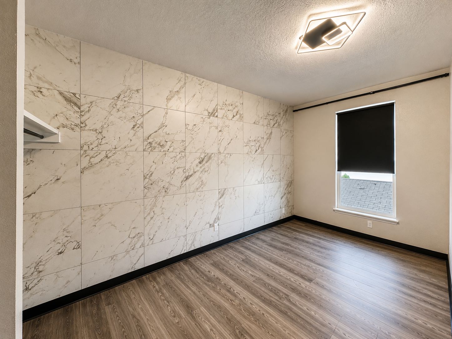 Classic studio with marble feature wall and window light